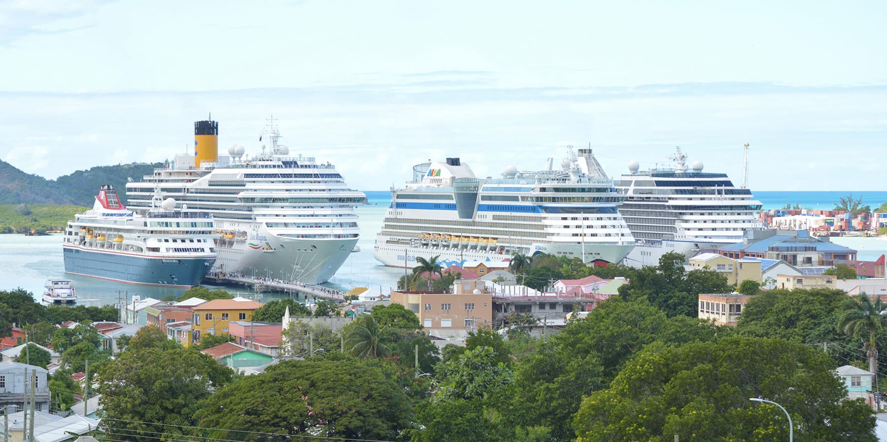 Cruise ships in St. John’s harbour, Antigua, above the colourful waterfront